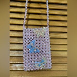 Crossbody phone pouch with butterflies by Five Below